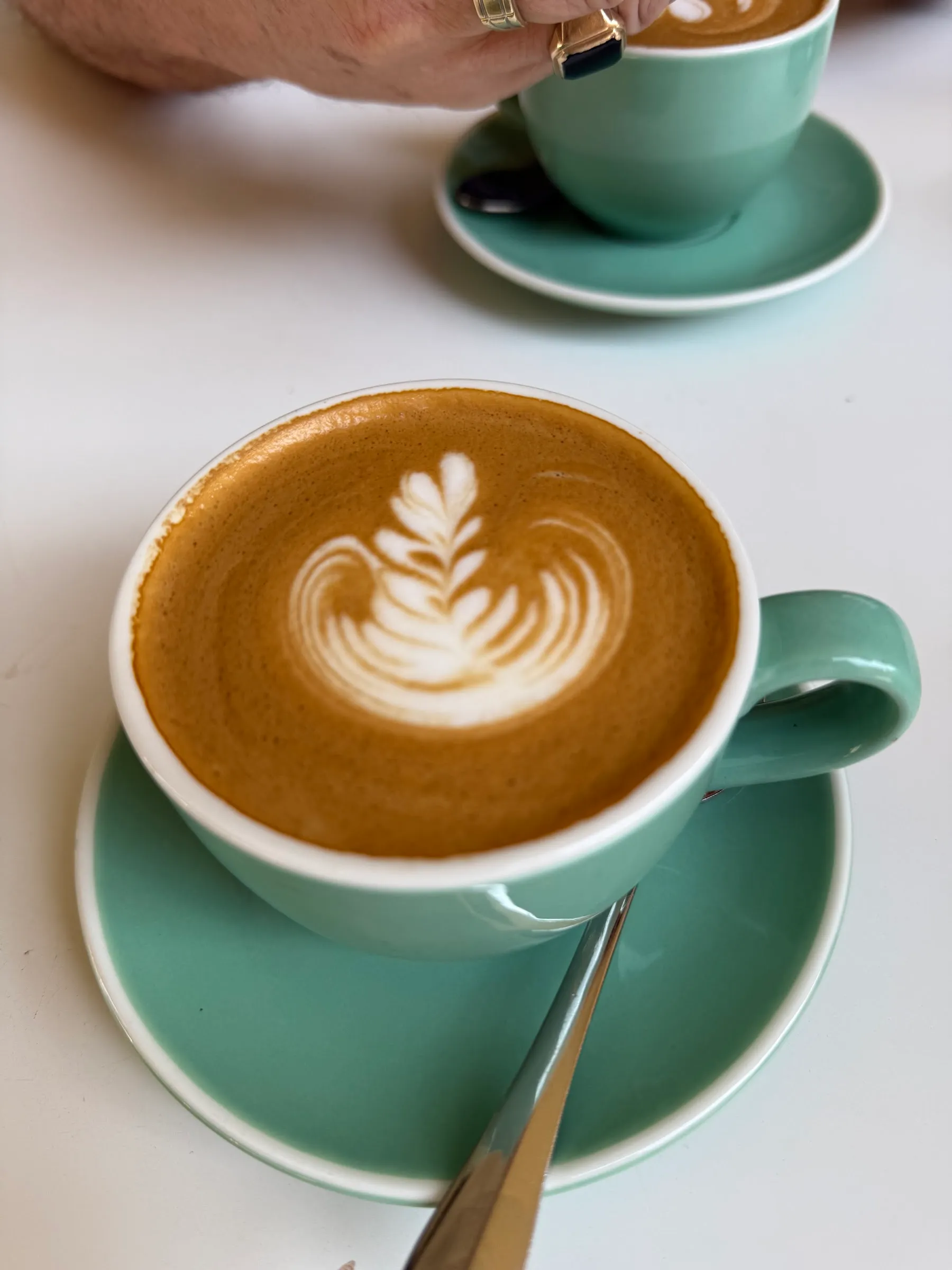 Latte art, two coffees